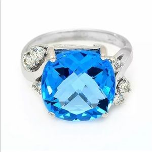 Real 7 carat blue topaz ring with diamonds